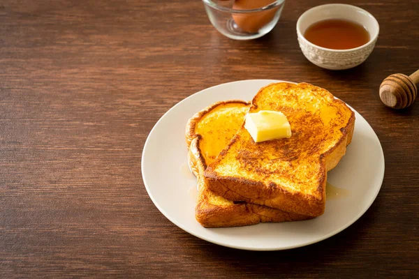 Γαλλική Φρυγανισμένη Βούτυρο Και Μέλι Για Πρωινό — Φωτογραφία Αρχείου