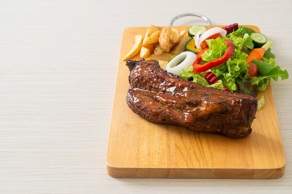 grill barbecue pork spare ribs with vegetables
