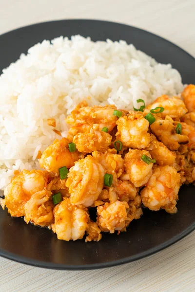 stir-fried shrimps with garlic and shrimps paste with rice