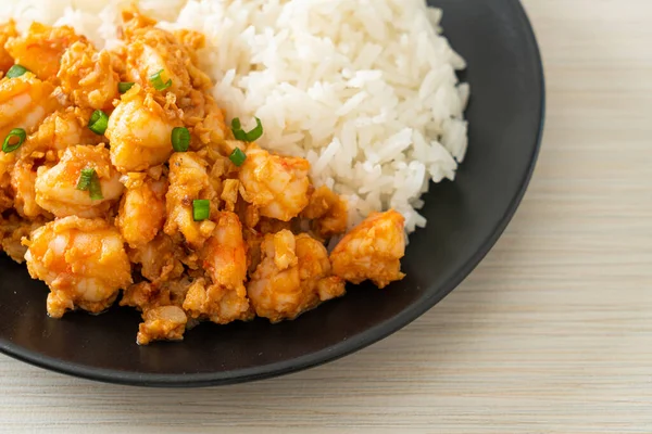 stir-fried shrimps with garlic and shrimps paste with rice