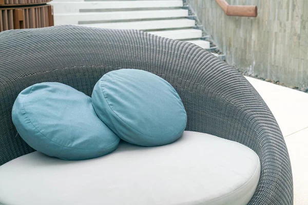 pillows decoration on outdoor patio wicker sofa