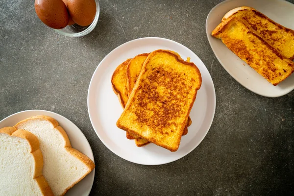 french toast on white plate for breakfast