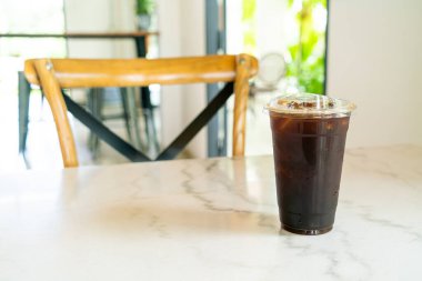iced americano coffee or long black coffee glass in coffee shop cafe