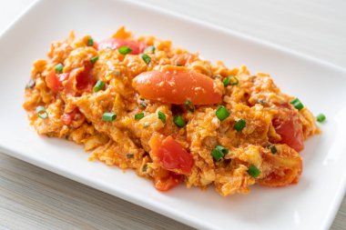 Stir-fried tomatoes with egg or Scrambled eggs with tomatoes - healthy food style