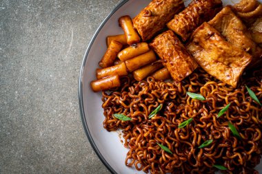 Jajangmyeon or JJajangmyeon with Odeng and Omuk - Korean Instant noodles with Korean fish cake in black bean sauce - Korean food style