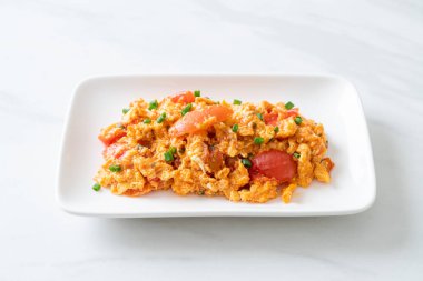 Stir-fried tomatoes with egg or Scrambled eggs with tomatoes - healthy food style