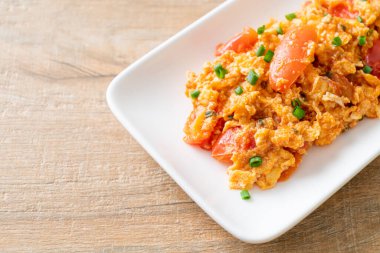 Stir-fried tomatoes with egg or Scrambled eggs with tomatoes - healthy food style