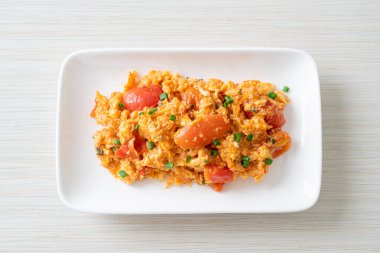 Stir-fried tomatoes with egg or Scrambled eggs with tomatoes - healthy food style