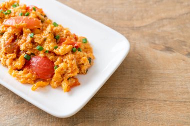 Stir-fried tomatoes with egg or Scrambled eggs with tomatoes - healthy food style