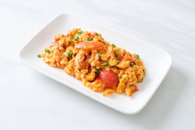 Stir-fried tomatoes with egg or Scrambled eggs with tomatoes - healthy food style