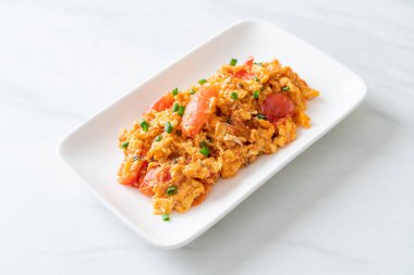 Stir-fried tomatoes with egg or Scrambled eggs with tomatoes - healthy food style