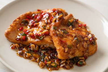 Fried Snapper Belly with Spicy Garlic Soy Sauce in Asian Style