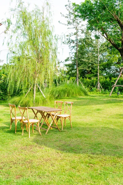 empty wood table and chair in garden