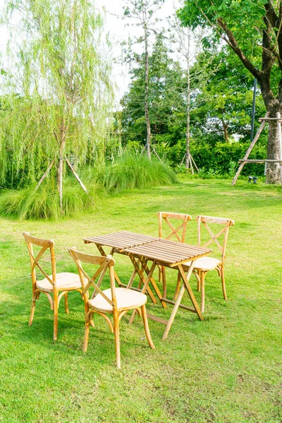 empty wood table and chair in garden