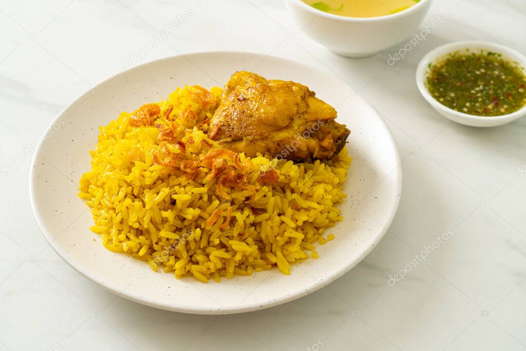 Chicken Biryani or Curried rice and chicken - Thai-Muslim version of Indian biryani, with fragrant yellow rice and chicken - Muslim food style