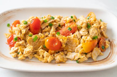 stir-fried tomatoes with egg on plate - healthy food style