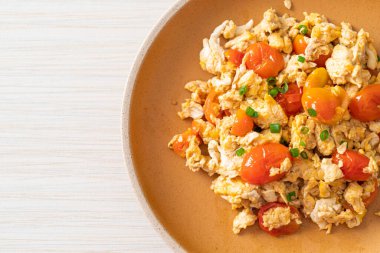 stir-fried tomatoes with egg on plate - healthy food style