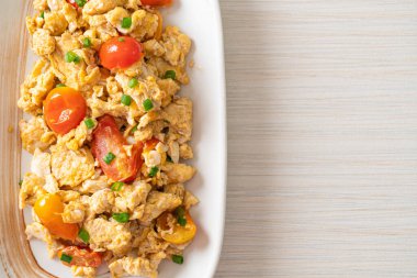 stir-fried tomatoes with egg on plate - healthy food style