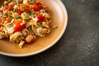 stir-fried tomatoes with egg on plate - healthy food style