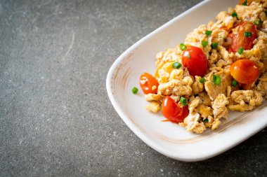 stir-fried tomatoes with egg on plate - healthy food style