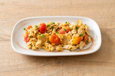 stir-fried tomatoes with egg on plate - healthy food style