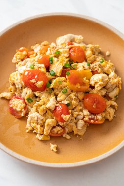 stir-fried tomatoes with egg on plate - healthy food style