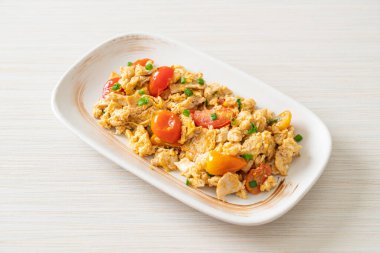 stir-fried tomatoes with egg on plate - healthy food style