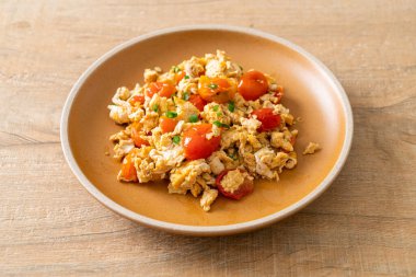 stir-fried tomatoes with egg on plate - healthy food style