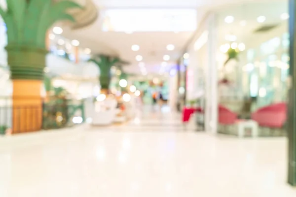 abstract blur shop and retail store in shopping mall for background