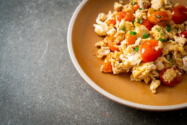 stir-fried tomatoes with egg on plate - healthy food style