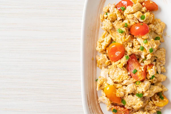 stir-fried tomatoes with egg on plate - healthy food style