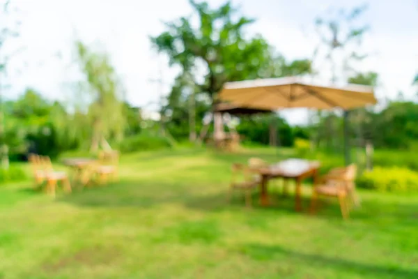 abstract blur outdoor coffee shop cafe and restaurant or garden yard for background