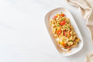 stir-fried tomatoes with egg on plate - healthy food style