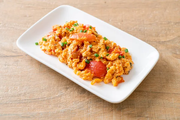 Stir-fried tomatoes with egg or Scrambled eggs with tomatoes - healthy food style