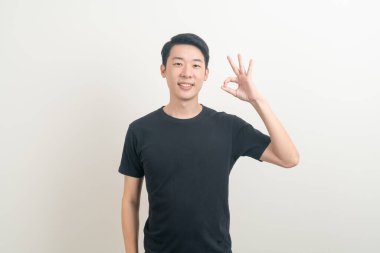 Genç Asyalı adamın portresi. Beyaz arka planda el yazısı.