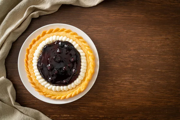 Delicious Blueberry Cheese Pie on white plate