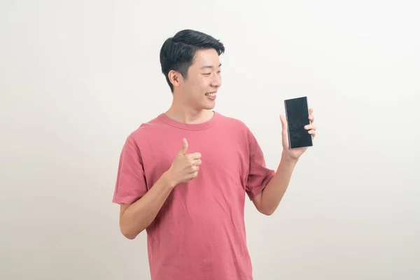 Young Asian Man Using Talking Smartphone Mobile Phone Happy Face — Stock Photo, Image