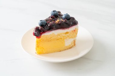 blueberry cheese cake - cheese cake with blueberry jam sauce on top