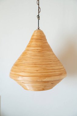 wood hanging lamp with white wall