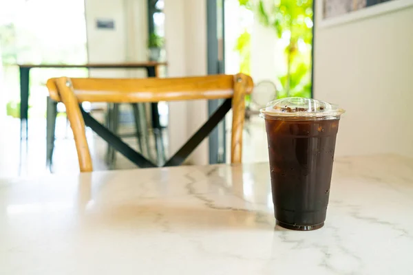 iced americano coffee or long black coffee glass in coffee shop cafe
