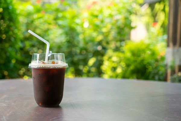 iced black coffee or americano coffee in takeaway glass