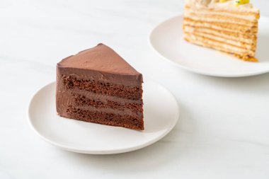 chocolate cake with soft chocolate layer on plate