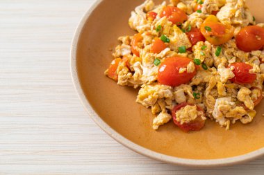 stir-fried tomatoes with egg on plate - healthy food style