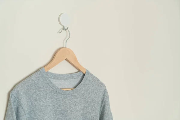 Grey Shirt Hanging Wood Hanger Wall — Zdjęcie stockowe