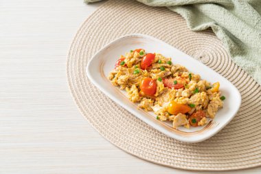 stir-fried tomatoes with egg on plate - healthy food style