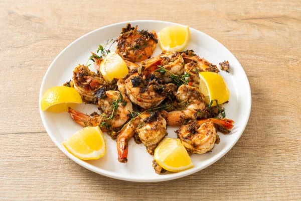 jerk shrimps or grilled shrimps in Jamaica style on plate