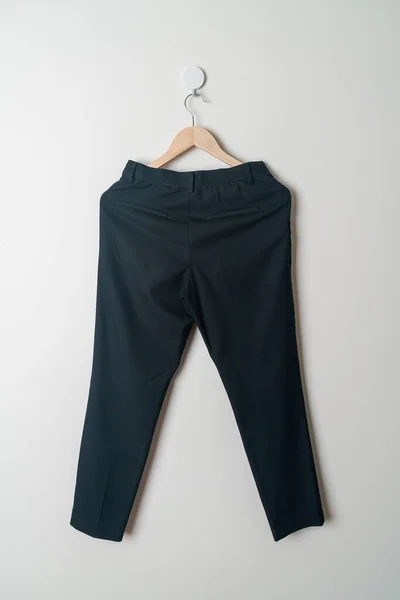 Trousers Long Pants Hanging Wood Hanger Wall — Stock Photo, Image