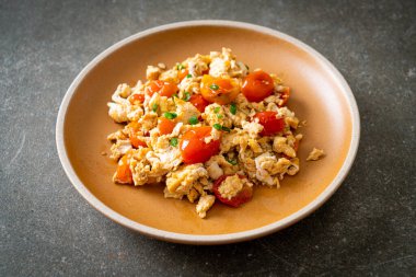 stir-fried tomatoes with egg on plate - healthy food style