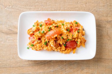 Stir-fried tomatoes with egg or Scrambled eggs with tomatoes - healthy food style