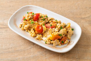 stir-fried tomatoes with egg on plate - healthy food style